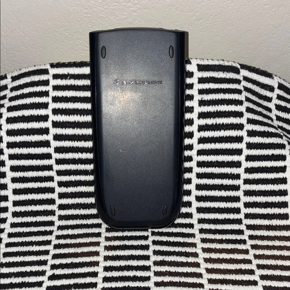 Texas Instruments TI-84 Plus Graphing Calculator - Black and Gray